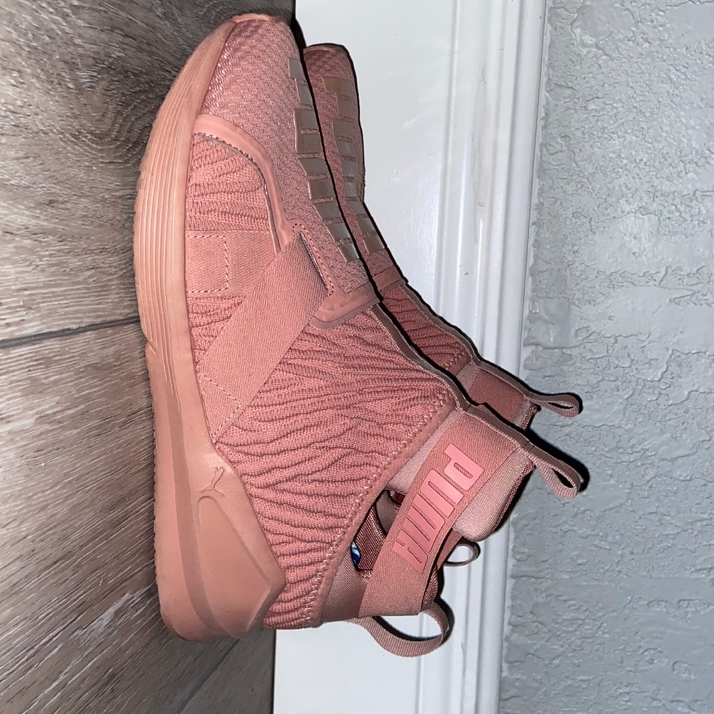 Pink Puma running shoes